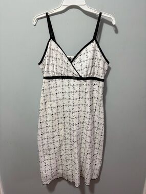 Studio 1940 White  sleeveless dress with Black Floral pattern